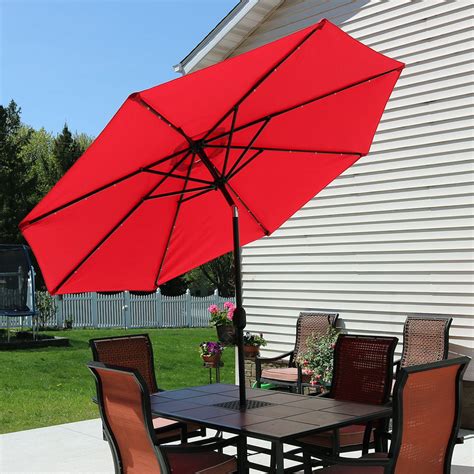 Umbrella Diameter 11 ft. . Solar patio umbrella